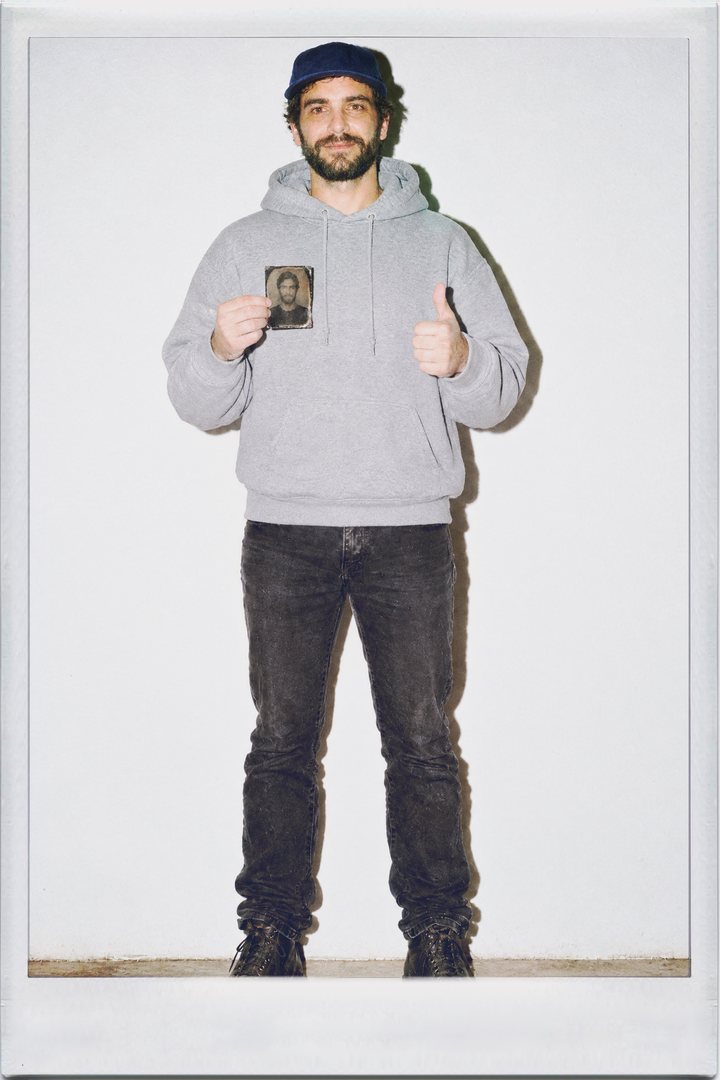 TinType, full length: a man holding a tintype plate of his own portrait